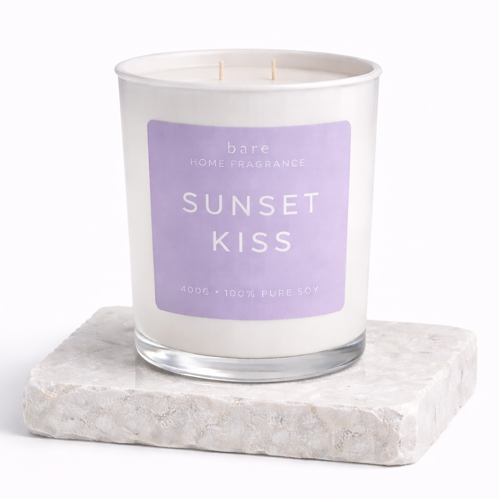Sunset Kiss soy candle in clear glass jar with pastel label perfume inspired cloud perfume