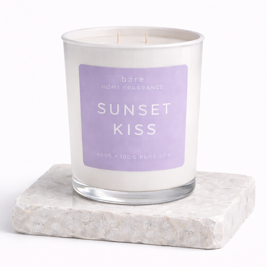 Sunset Kiss soy candle in clear glass jar with pastel label perfume inspired cloud perfume